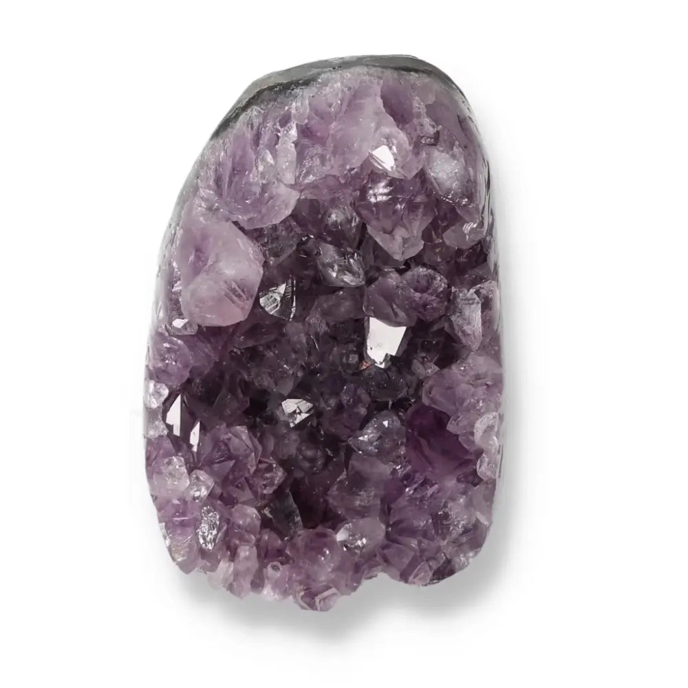 Exquisite Amethyst cut base geode from Sylvia Crystals, showcasing unique crystal formations and spiritual depth.