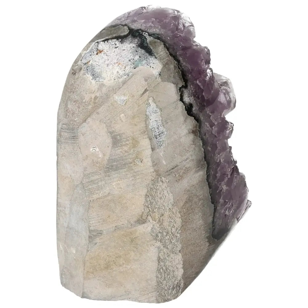 Amethyst cut base geode with purple crystals from Sylvia Crystals, offering elegance and spiritual depth.