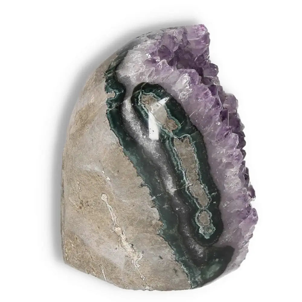 Amethyst cut base geode from Sylvia Crystals, enhancing spiritual harmony and elegance, ideal for home or office decor.