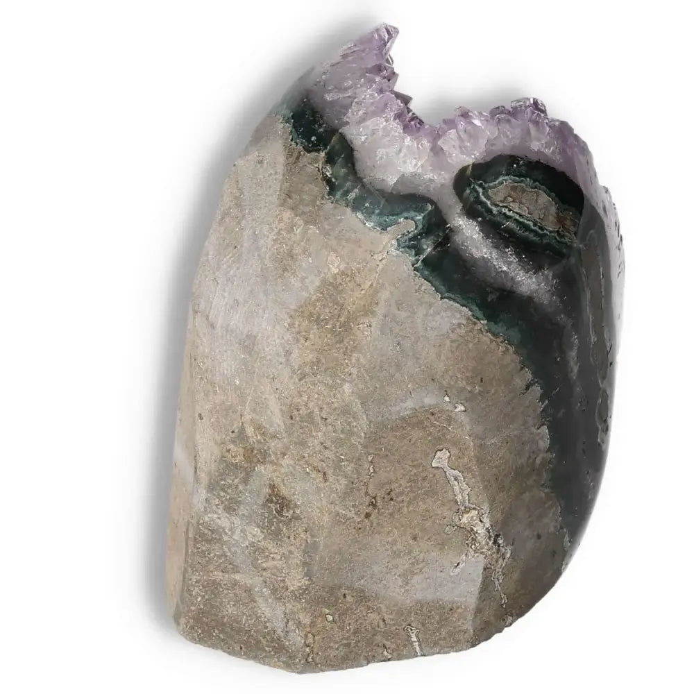 Amethyst cut base geode from Sylvia Crystals, featuring natural elegance and spiritual harmony for stress relief and energy enhancement.