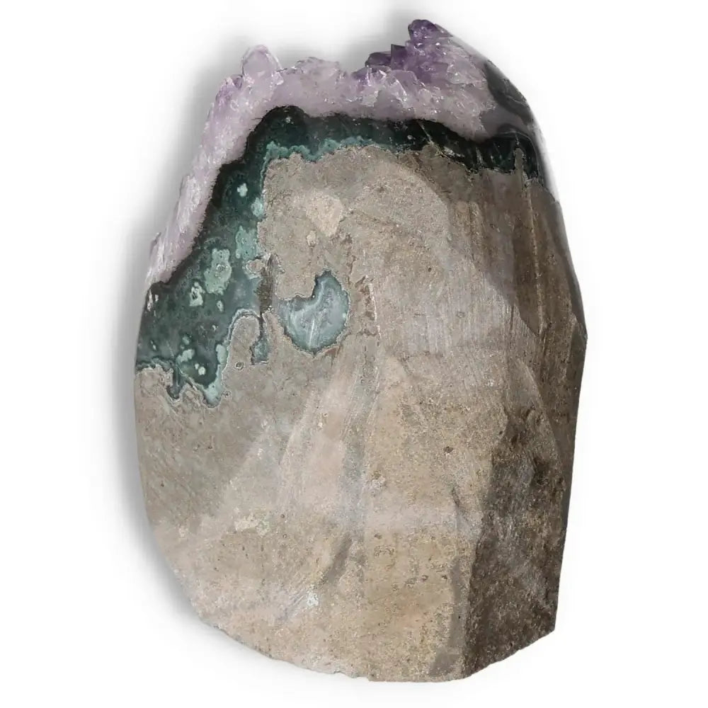 Amethyst cut base geode from Sylvia Crystals, showcasing elegant purple crystals and natural stone base, ideal for stress relief and energy enhancement.