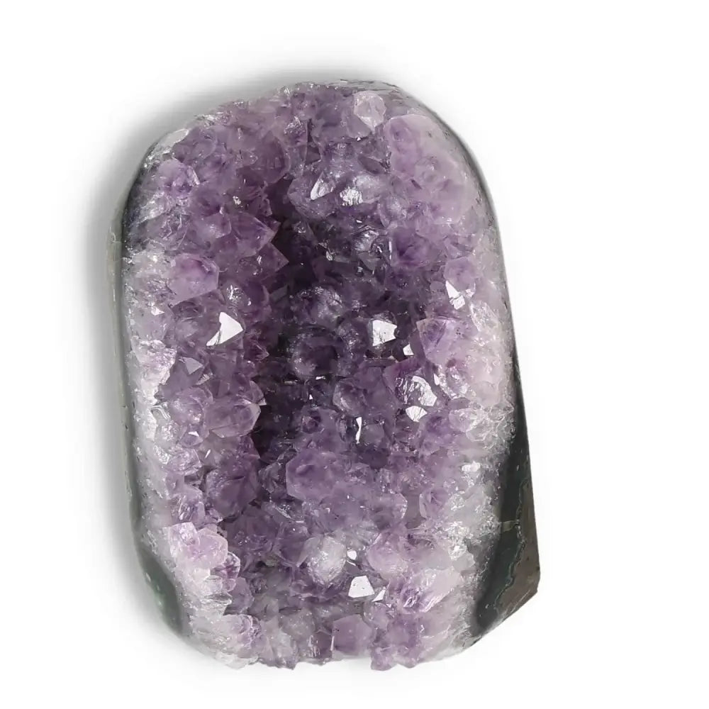 Elegant Amethyst cut base geode from Sylvia Crystals, promoting stress relief and energy enhancement.