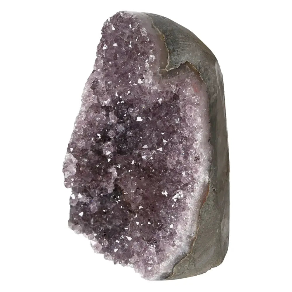 Amethyst cut base geode from Sylvia Crystals, premium crystal for stress reduction and elegance, source of positive energy.