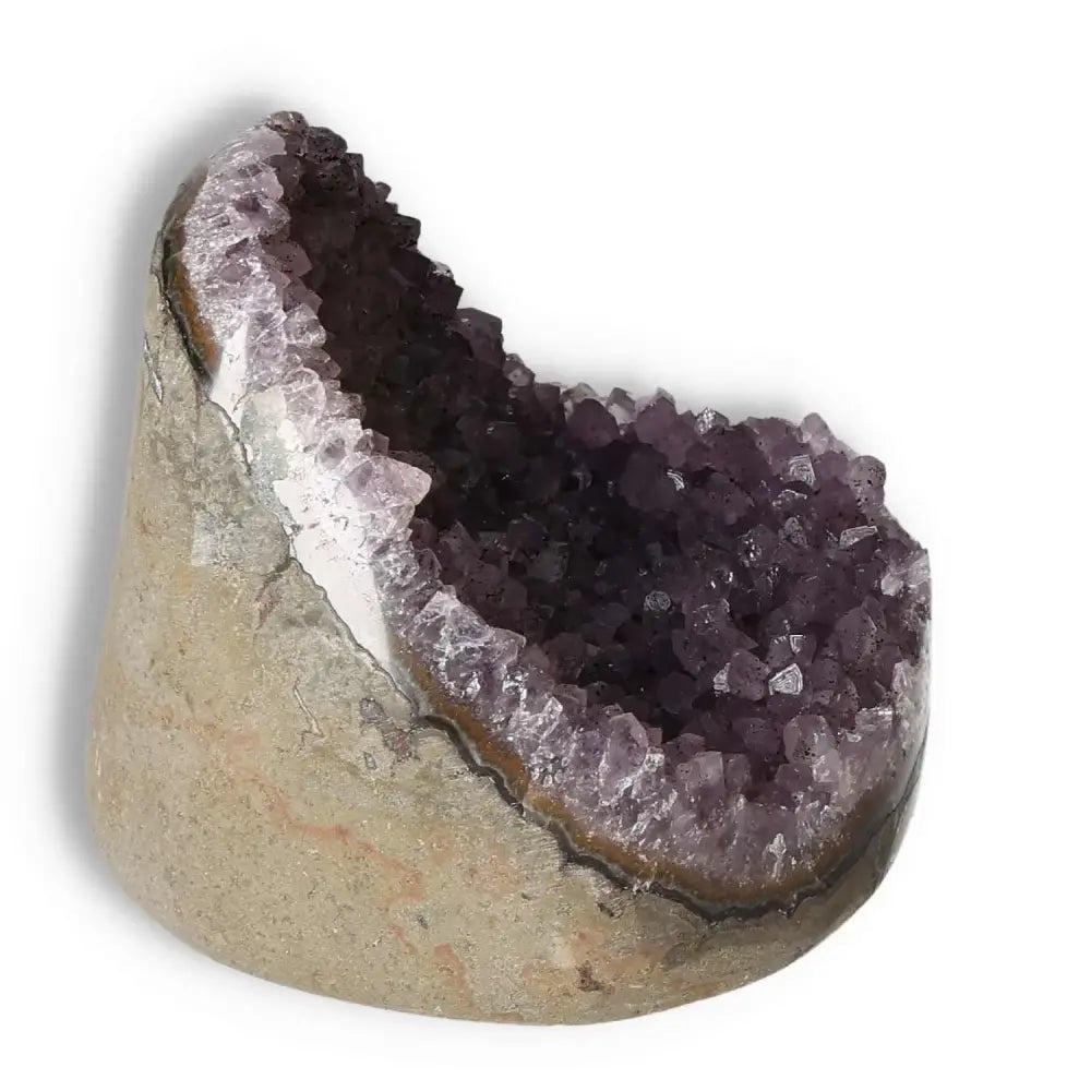 Amethyst cut base geode by Sylvia Crystals, showcasing radiant purple tones and premium craftsmanship for stress relief and focus.