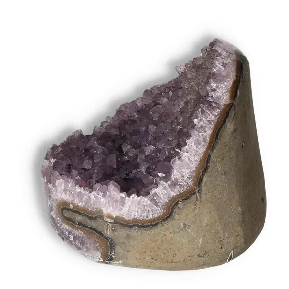 Amethyst cut base geode by Sylvia Crystals with radiant purple tones, ideal for stress relief and emotional stability.