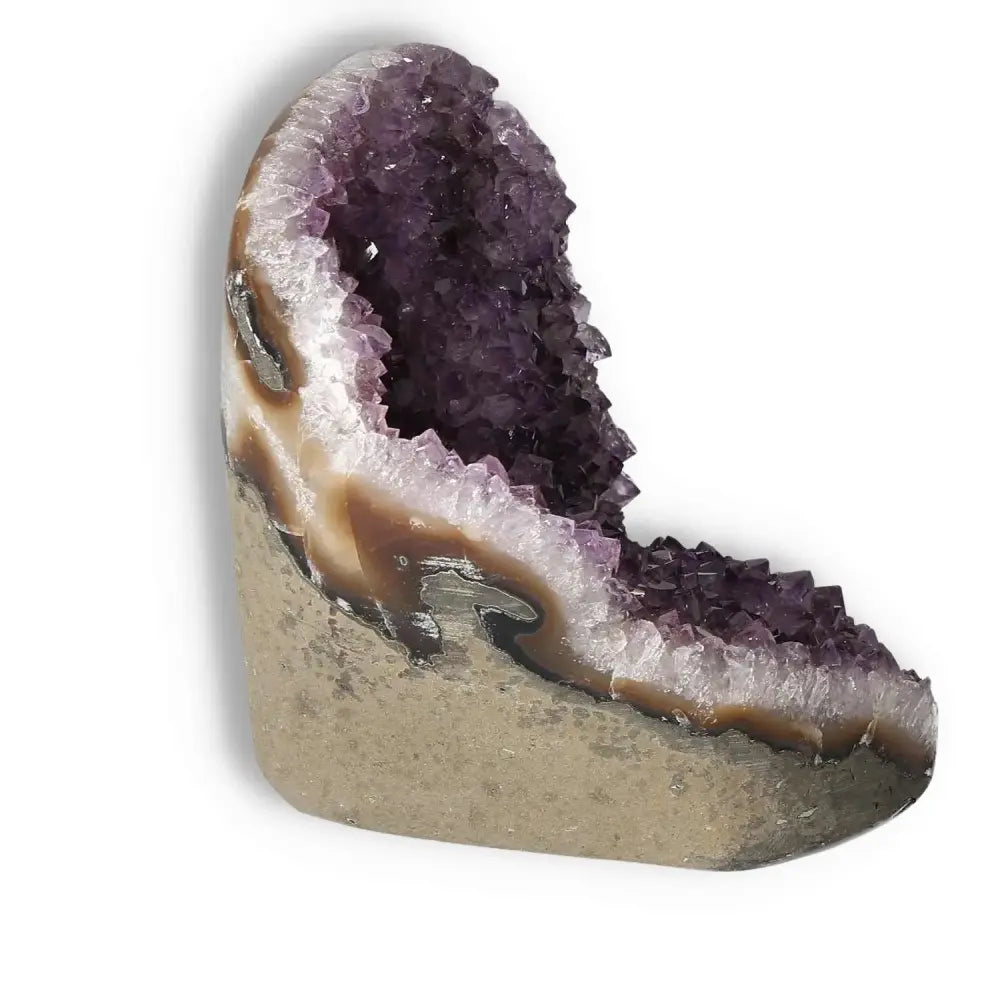 Amethyst cut base geode crystal showcasing vibrant purple hues and natural texture, offering spiritual depth and transformative energy.