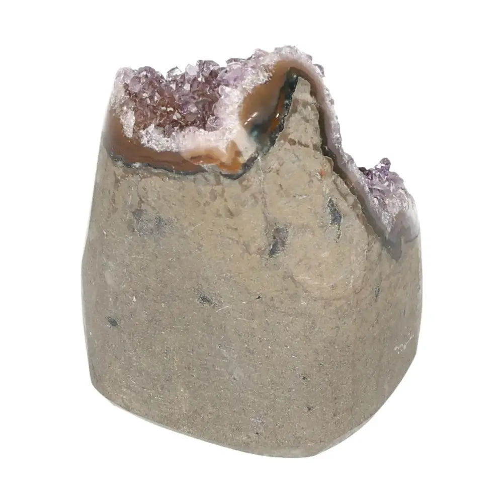 Amethyst cut base geode crystal, luxury centerpiece by Sylvia Crystals, offering tranquility and spiritual harmony.