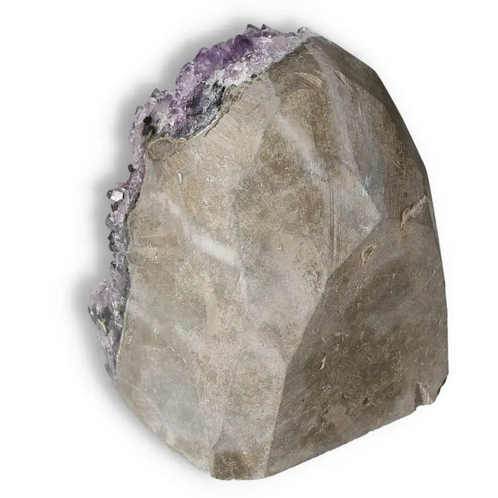 Amethyst cut base geode from Sylvia Crystals, showcasing its natural elegance and spiritual benefits for mental wellness.