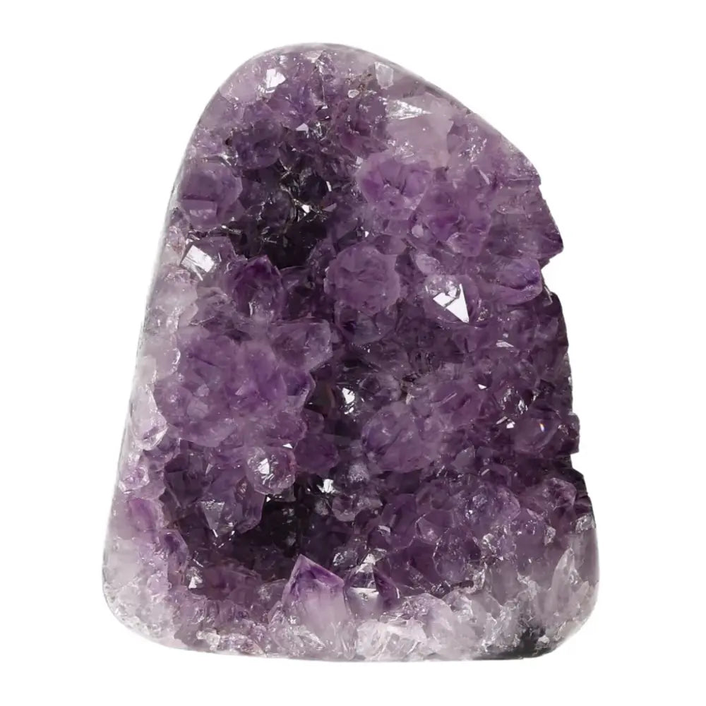 Amethyst cut base geode by Sylvia Crystals; a stunning purple gemstone celebrated for stress relief and spiritual elegance.