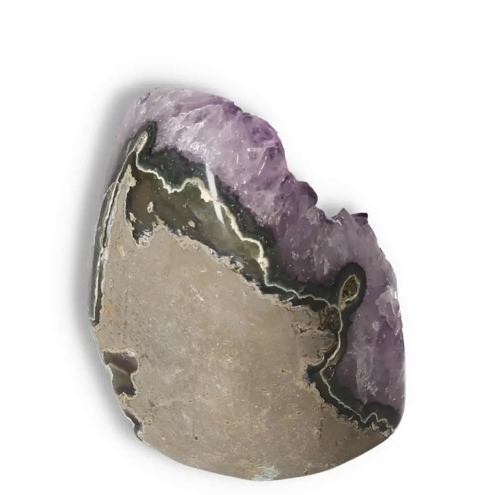 Amethyst cut base geode by Sylvia Crystals showcasing its natural beauty, ideal for stress alleviation and spiritual elegance.