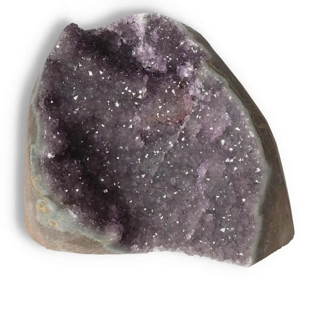 Amethyst cut base geode from Sylvia Crystals with vibrant purple hues and crystalline texture for stress relief and energy boost.