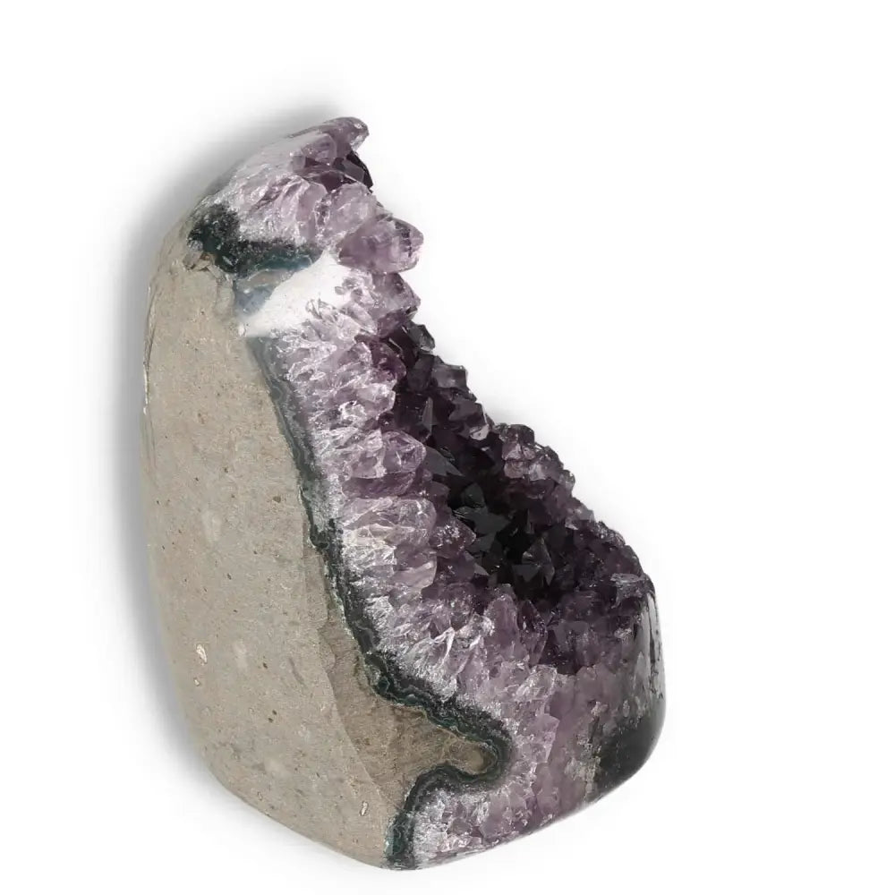 Amethyst cut base geode from Sylvia Crystals, showcasing exquisite purple crystals and unique formation, ideal for enhancing space energy.