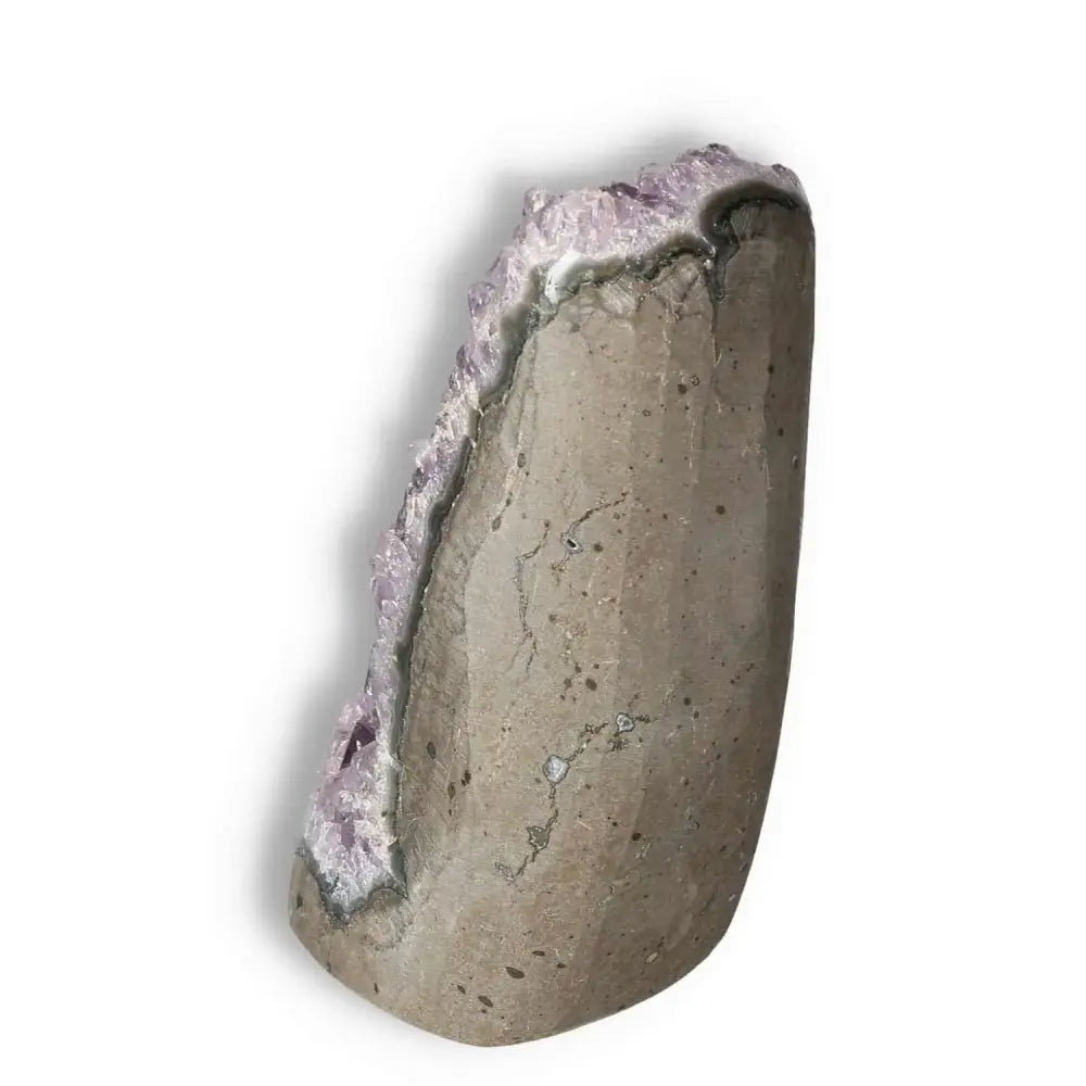 Amethyst cut base geode from Sylvia Crystals, showcasing natural beauty and stress-relieving properties, premium quality.