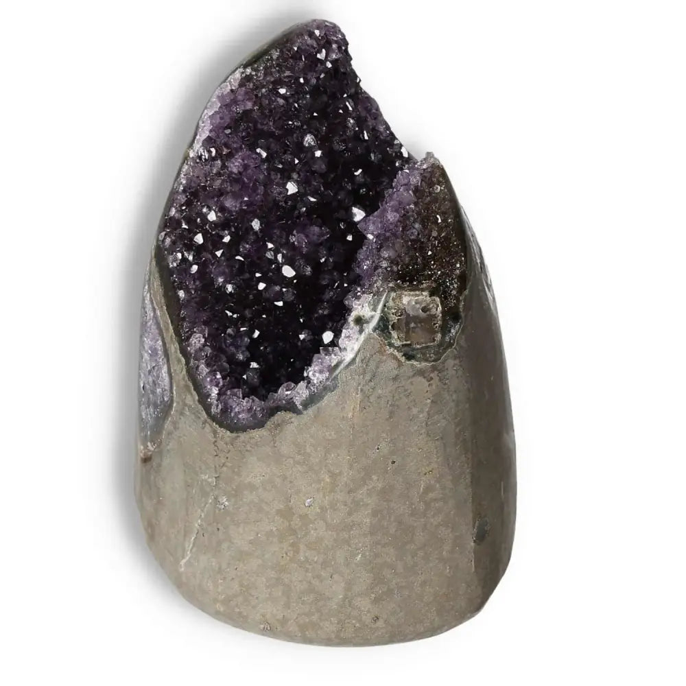 Amethyst cut base geode from Sylvia Crystals, showcasing deep purple crystals, ideal for reducing stress and enhancing concentration.