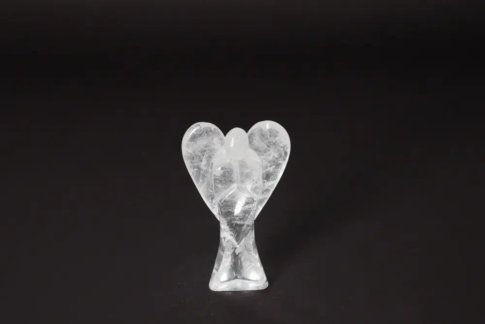 Angel Lemurian Quartz figurine, 11 cm, known for stress reduction, energy boost, and enhancing concentration, against a dark background.