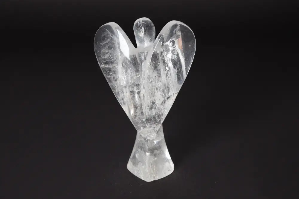 Clear quartz angel statue measuring 15 cm, promotes stress reduction, energy boost, concentration, and emotional stability.