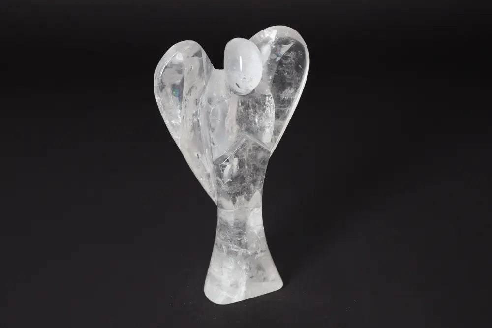 Clear Angel Lemurian Quartz sculpture, 15 cm, known for stress reduction and energy boost, enhancing focus and emotional stability.