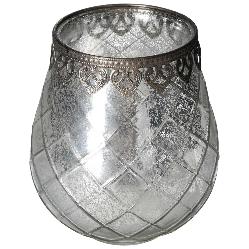 Antique style lantern with silver metal finish and ornate detailing, perfect for enhancing home decor and conscious living spaces.
