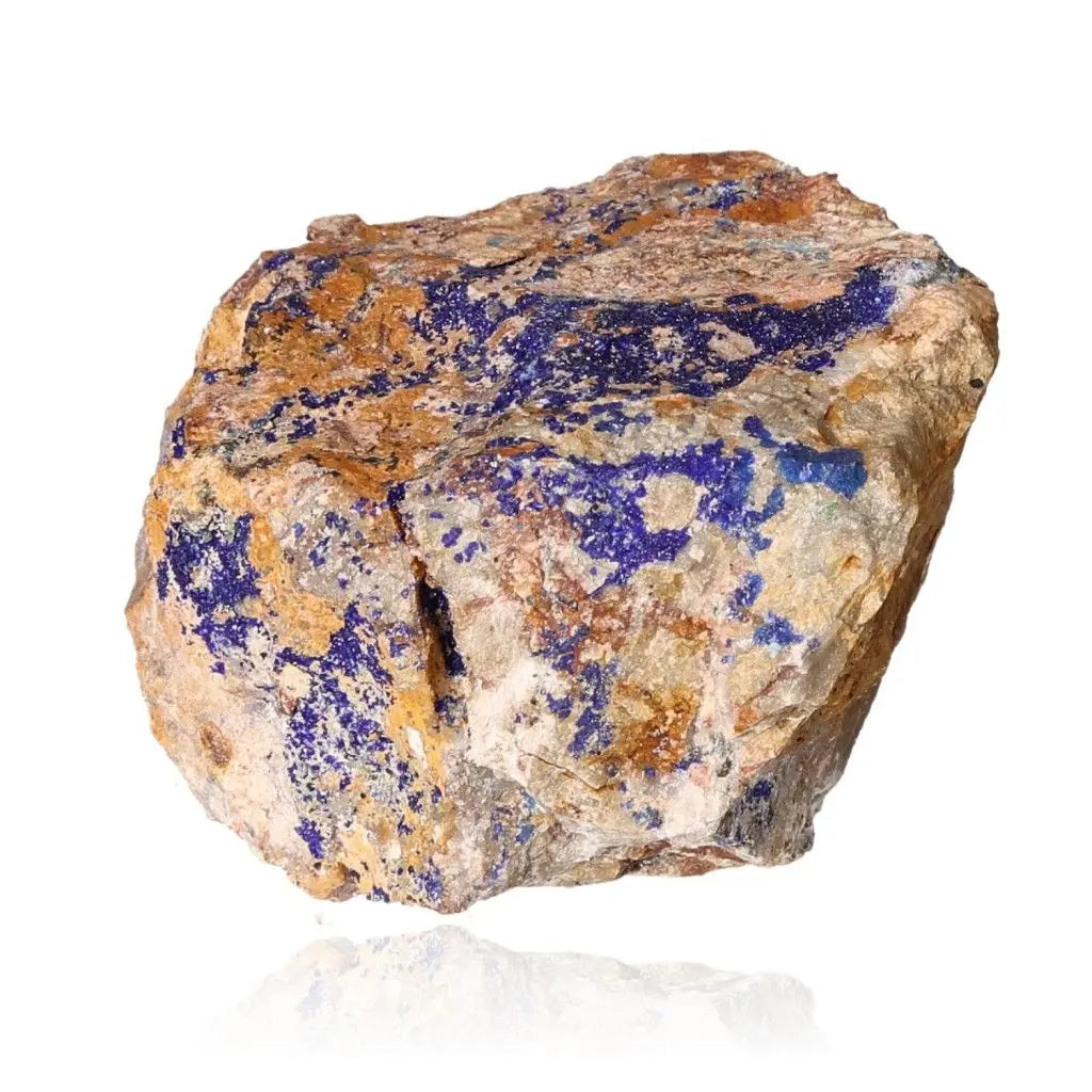 Azurite stone displaying deep blue hues and unique patterns, known for enhancing mental clarity, focus, and self-awareness.