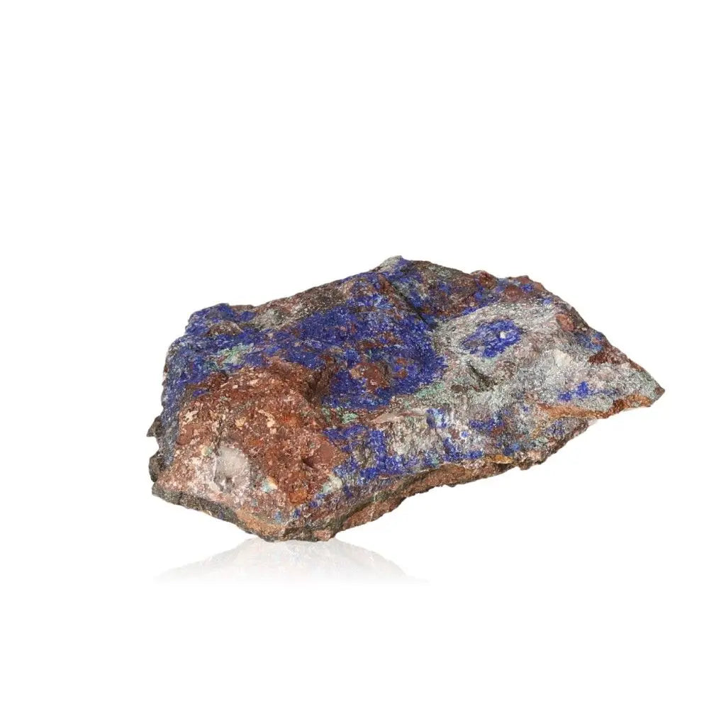 Azurite gemstone showcasing deep blue hues and copper patterns, ideal for enhancing mental clarity and self-awareness in personal growth.