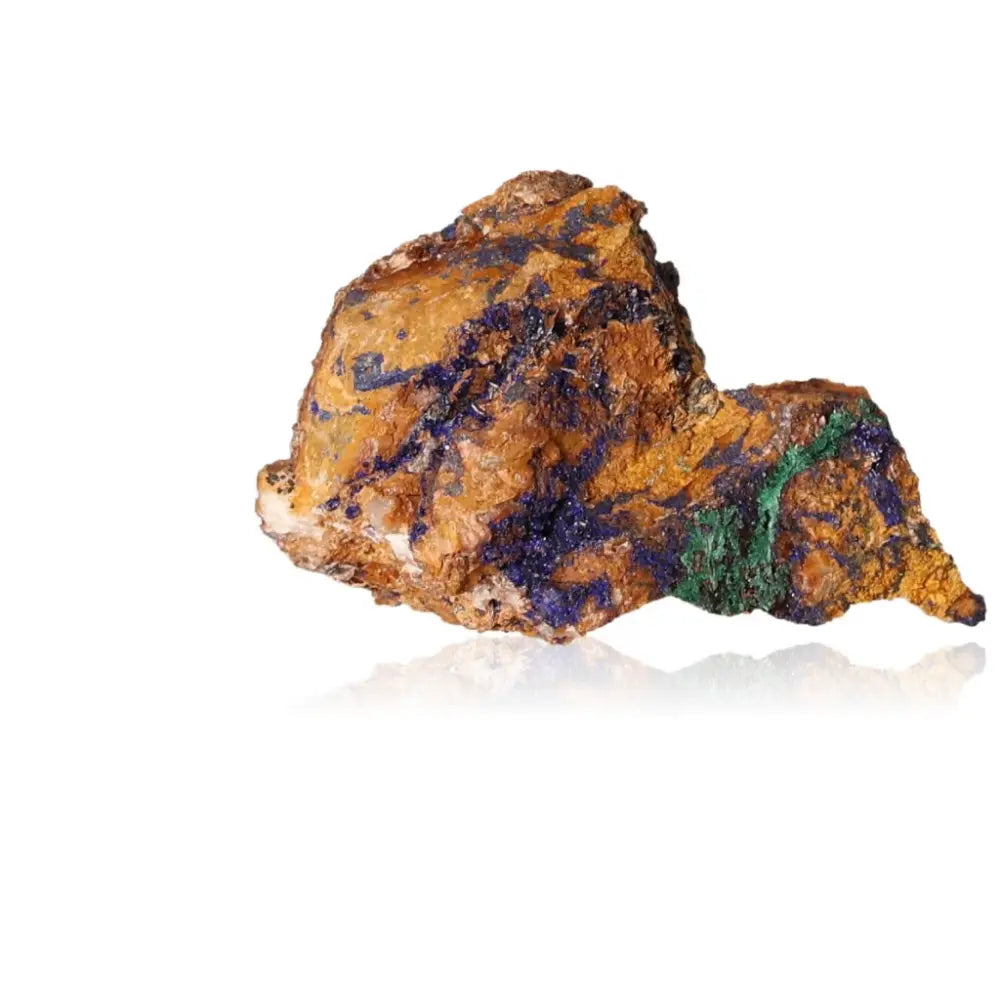 Azurite druzy stone showcasing deep blue hues and green accents, known for enhancing intuition and spiritual insight.