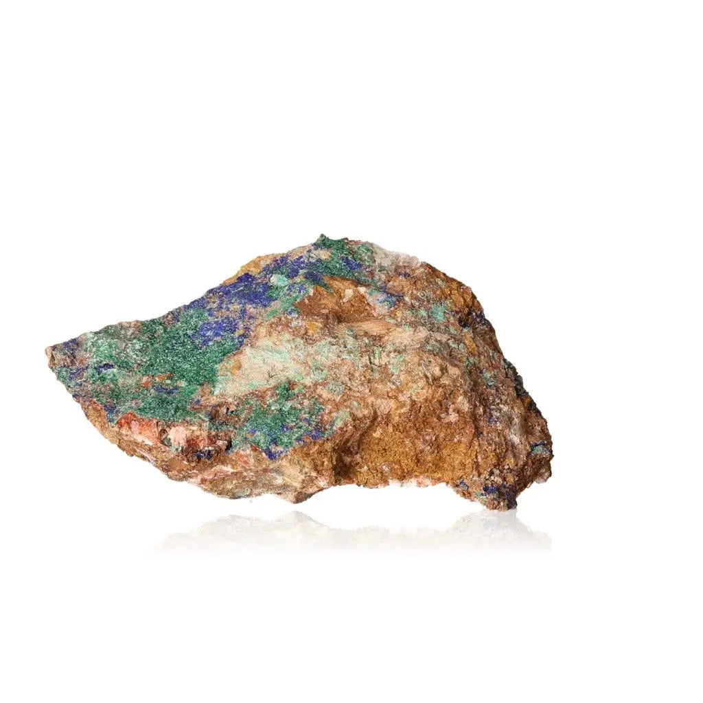 Azurite with Malachite mineral showcasing deep blue and green hues on a rough stone texture, symbolizing clarity and transformation.