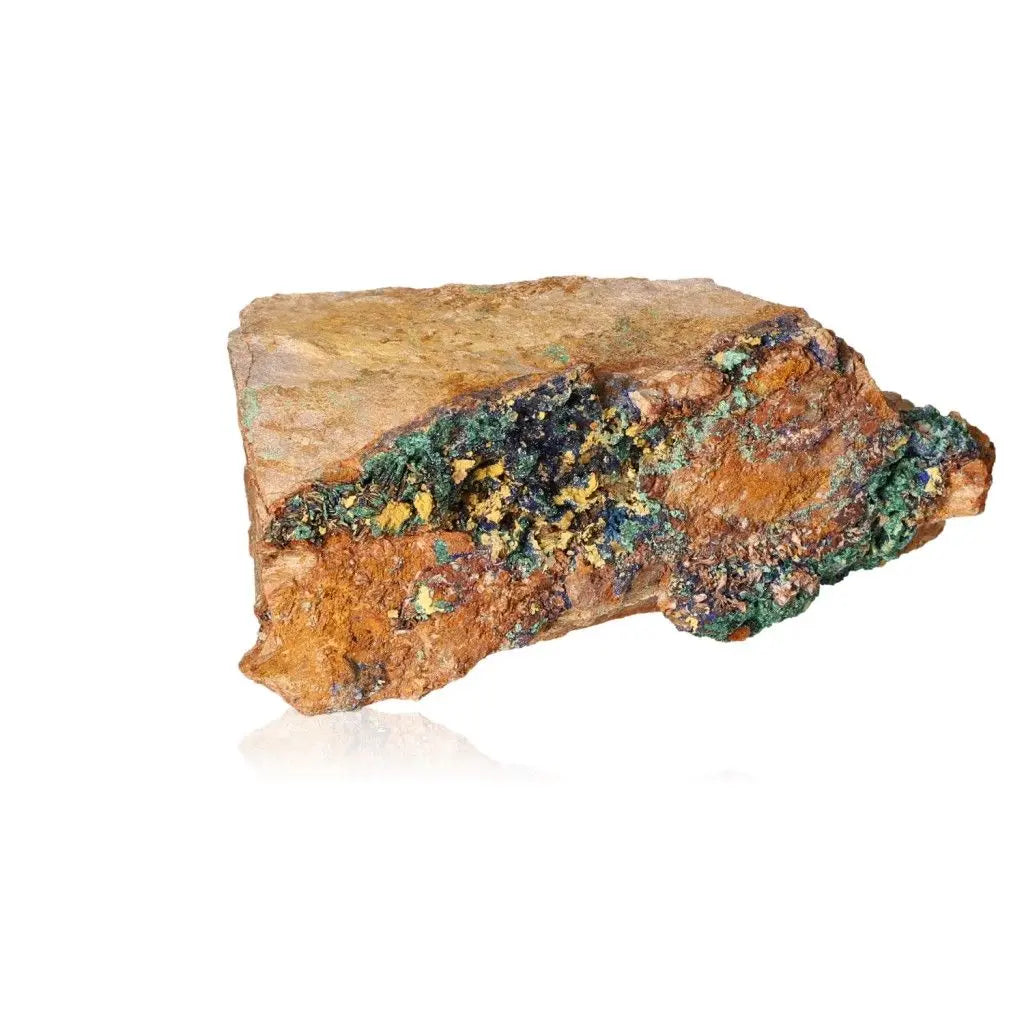 Azurite with Malachite druzes mineral specimen showcasing deep blue and green hues on a brown rock surface.