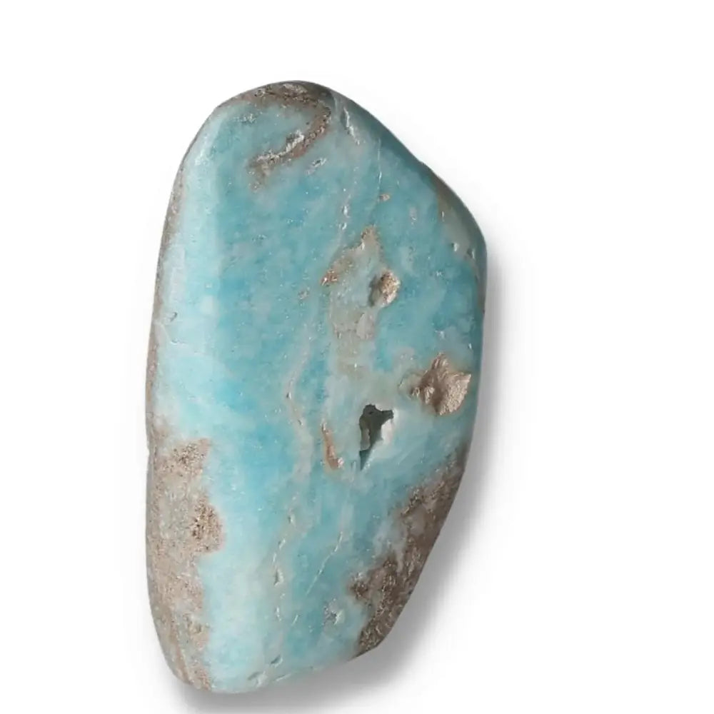 Polished Blue Aragonite crystal with soothing blue hues over a white background.