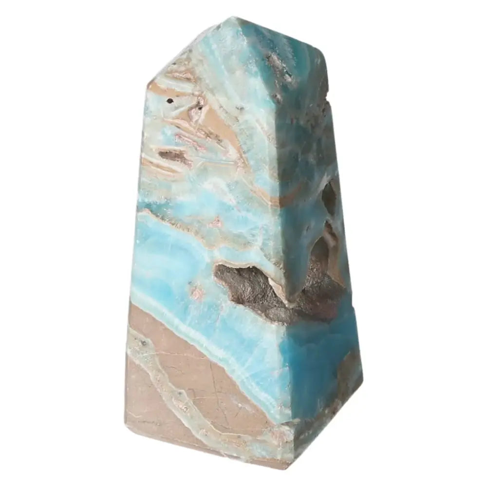 Blue Aragonite Tower crystal with soothing blue hues, known for emotional healing and spiritual connection. Ideal for meditation or décor.