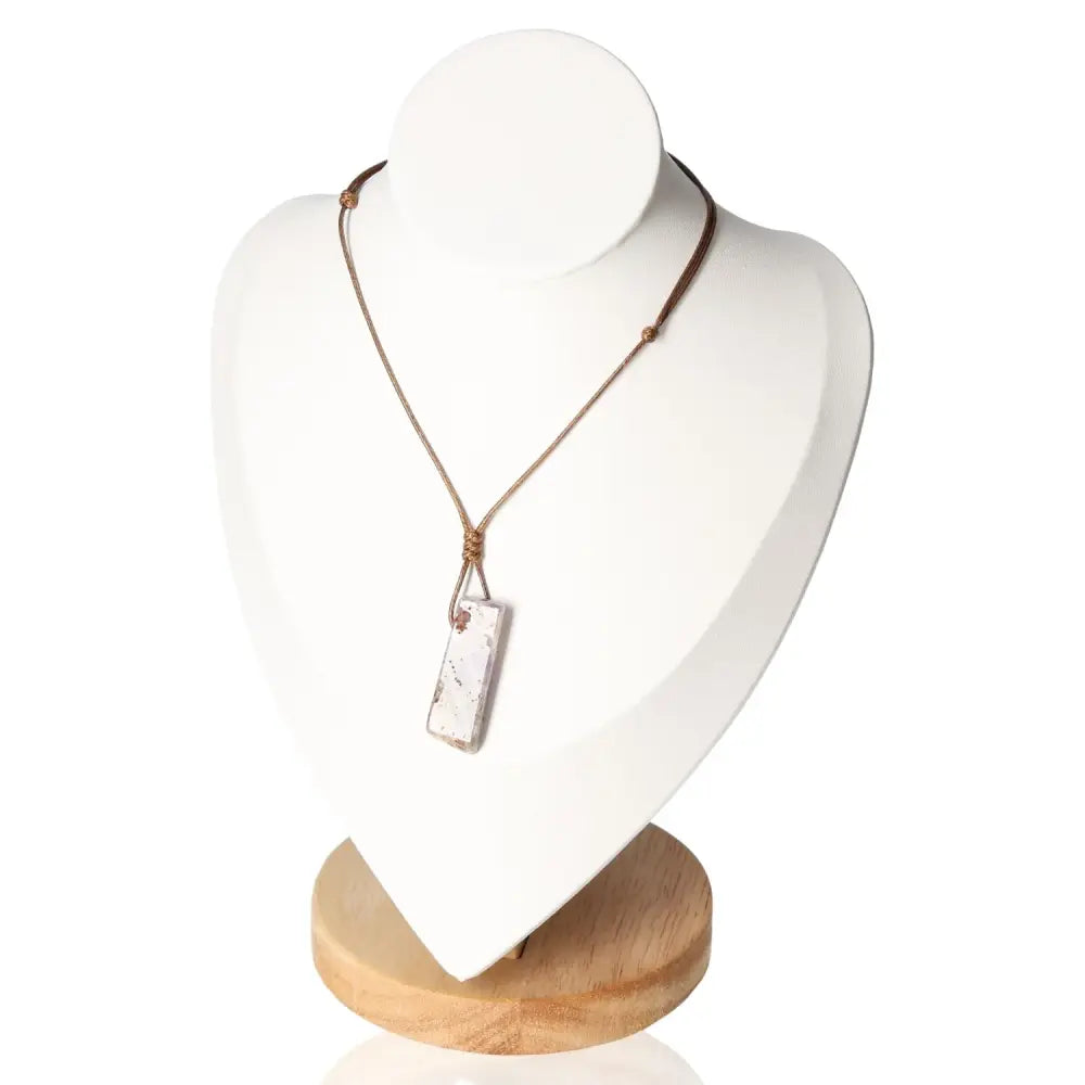 Boho Necklace Amethyst displayed on stand, featuring a genuine amethyst stone pendant. Perfect blend of elegance and bohemian style.