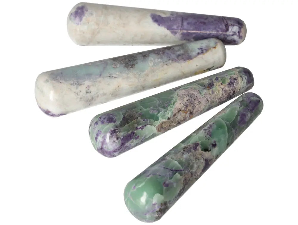 Four smooth Bolivianite wands with a mix of green and purple hues, polished for metaphysical healing and energy balancing.