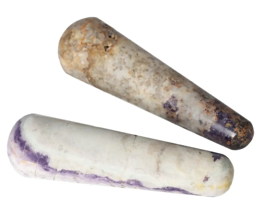 Two polished Bolivianite wands with natural patterns and colors, ideal for crystal healing and energy balancing.