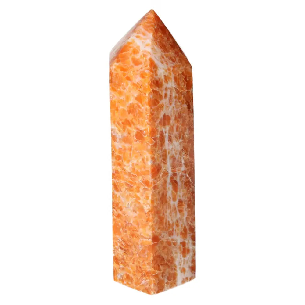 Calcite Orchid crystal tower from Sylvia Crystals, enhancing self-confidence and spiritual growth.