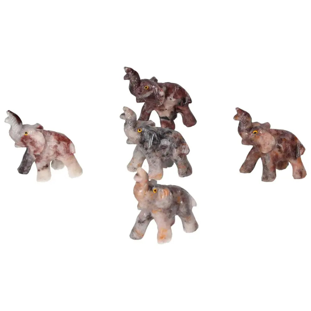 Hand-carved crystal elephant figurines made from high-quality magnesite, enhancing spiritual meditation practices.
