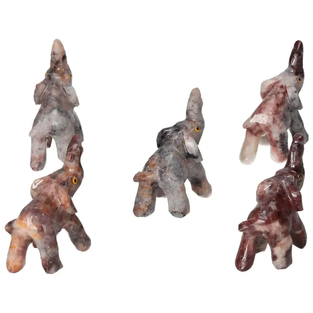 Hand-carved crystal elephant figurines from high-quality magnesite, perfect for enhancing spirituality and meditation practices.
