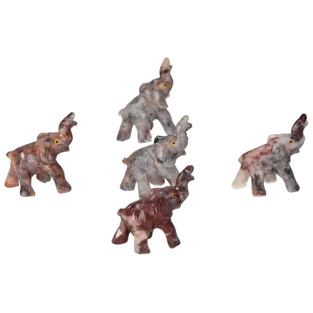 Carved Crystal Elephants made from high-quality magnesite by Sylvia Crystals, embodying spirituality and luxury for meditation practices.