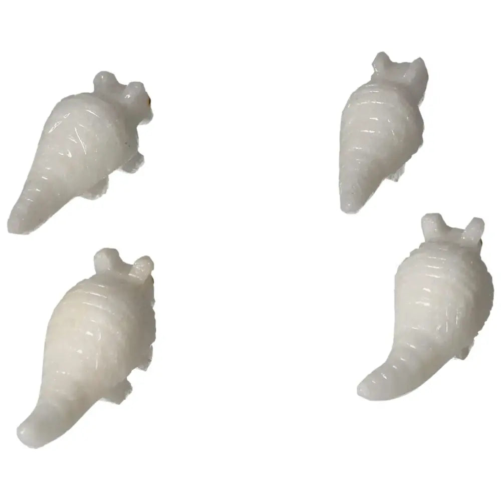 Handcrafted Carved Dolomite Armadillos by Sylvia Crystals, symbolizing serenity and artistic craftsmanship.