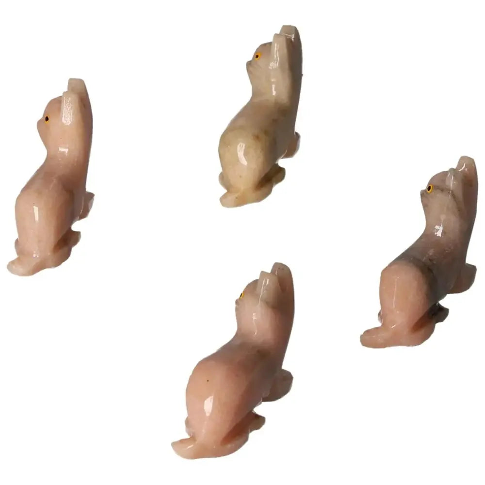 Carved Dolomite Cat figurines showcasing elegant design and craftsmanship from Sylvia Crystals. Ideal for luxury decor and emotional balance.