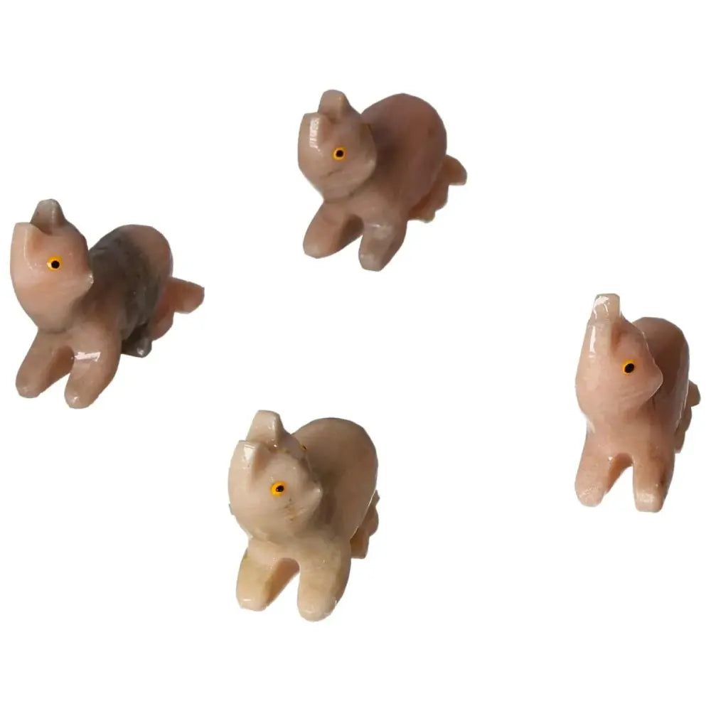 Handcrafted Carved Dolomite Cat figurines from Sylvia Crystals, enhancing emotional stability with elegance and tranquility.