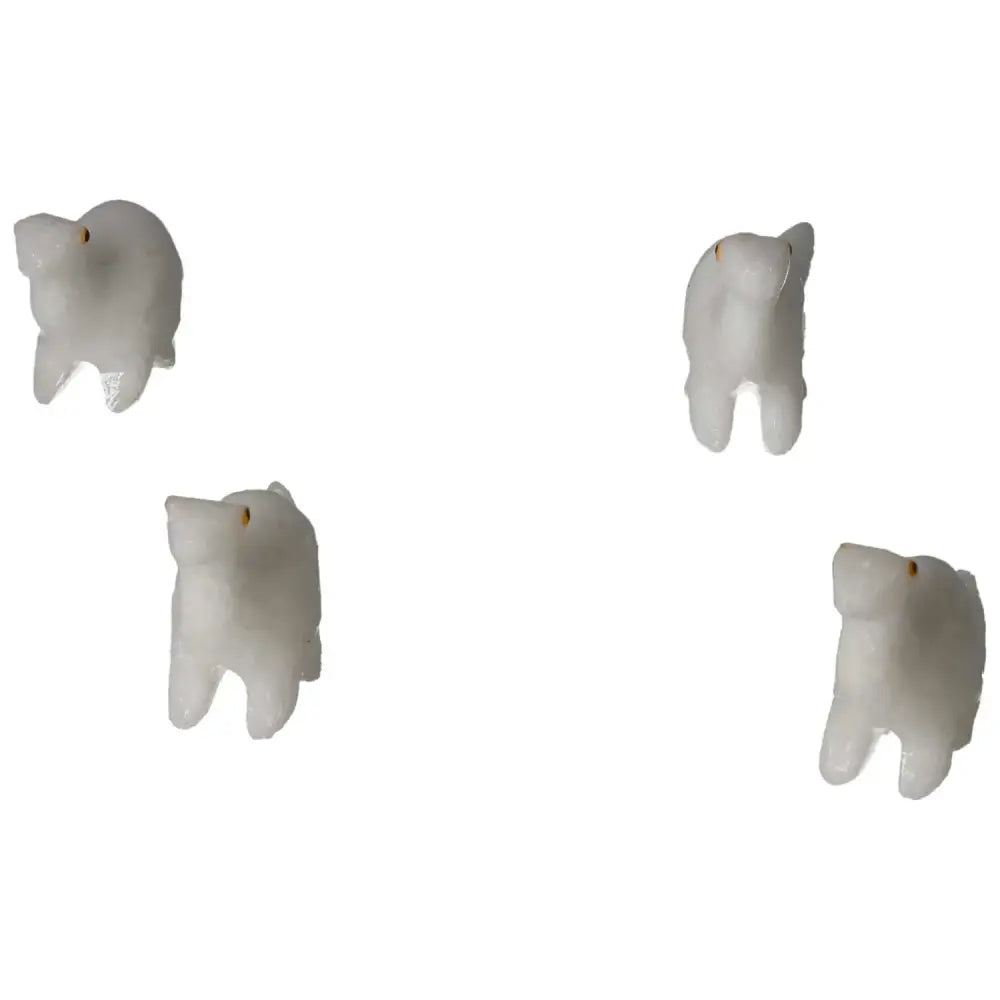 Carved Dolomite Dinosaur figurines by Sylvia Crystals, showcasing exquisite craftsmanship and grounding properties.