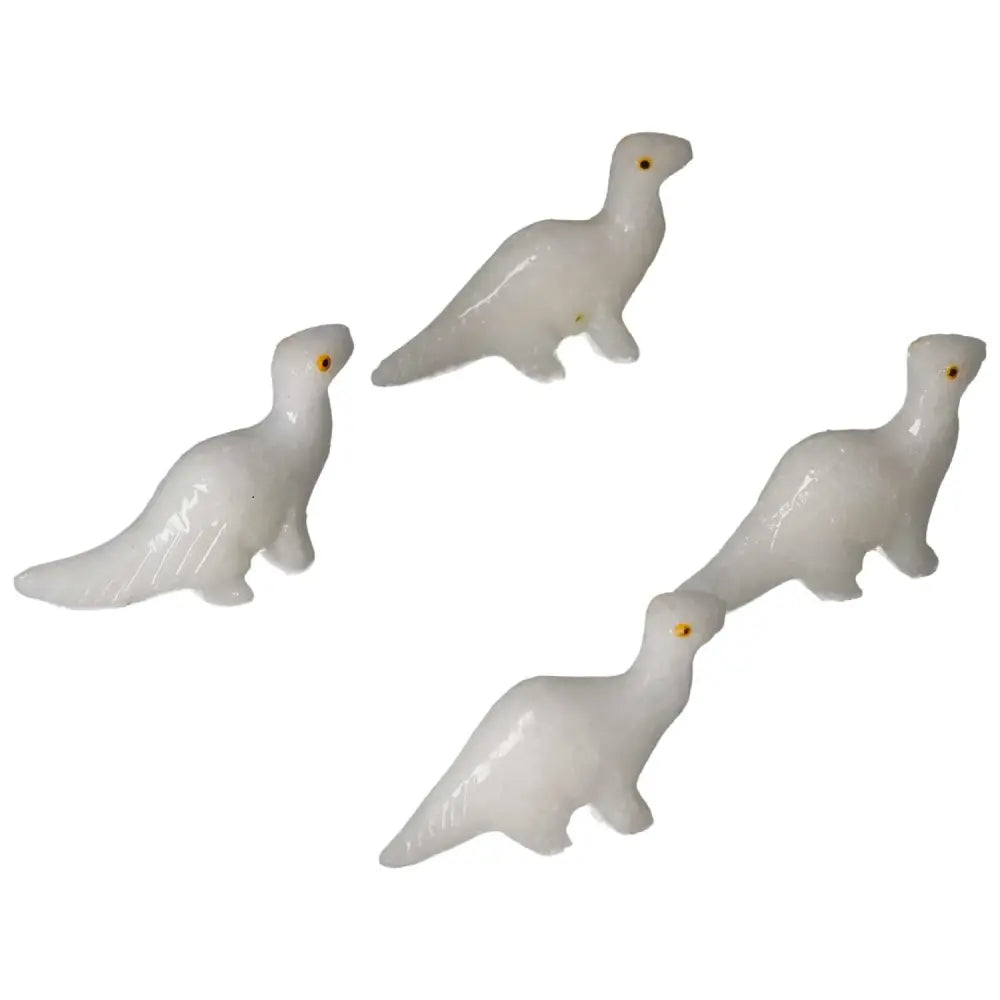 Carved Dolomite Dinosaur figurines showcasing exquisite craftsmanship by Sylvia Crystals, designed for emotional balance and serenity.