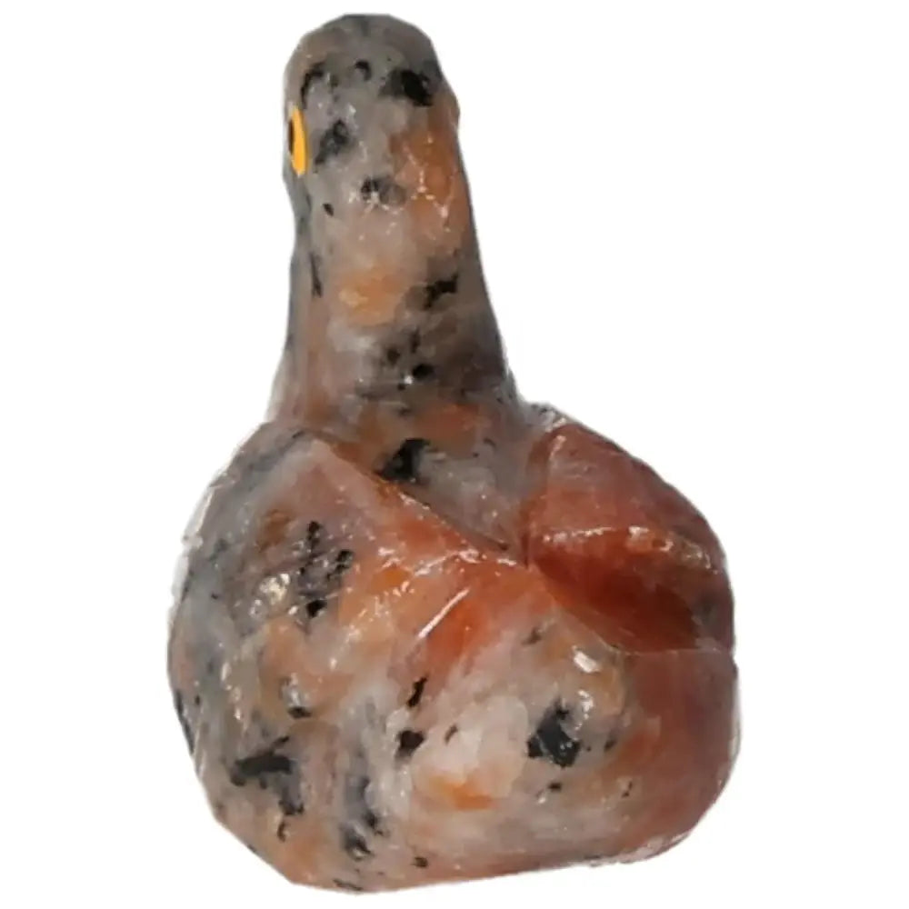 Handcrafted Carved Dolomite Duck by Sylvia Crystals, showcasing grounding and calming properties. Elegant decorative piece.