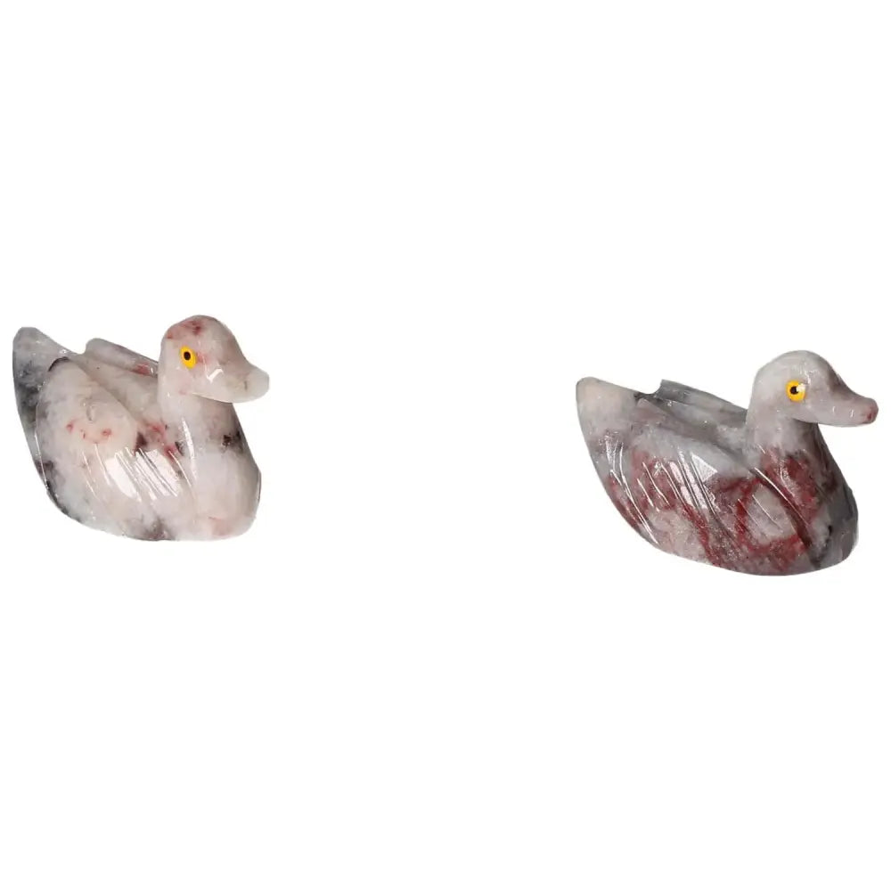Carved Dolomite Duck figurines by Sylvia Crystals, showcasing hand-crafted elegance and luxury, ideal for enhancing spiritual wellness.