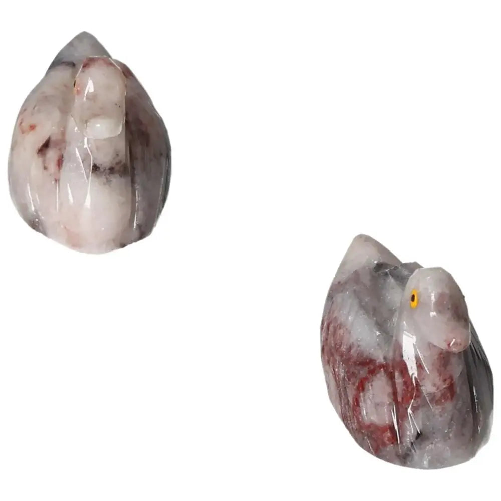 Carved Dolomite Duck by Sylvia Crystals, showcasing exquisite hand-carved details that enhance luxury and promote spiritual wellness.