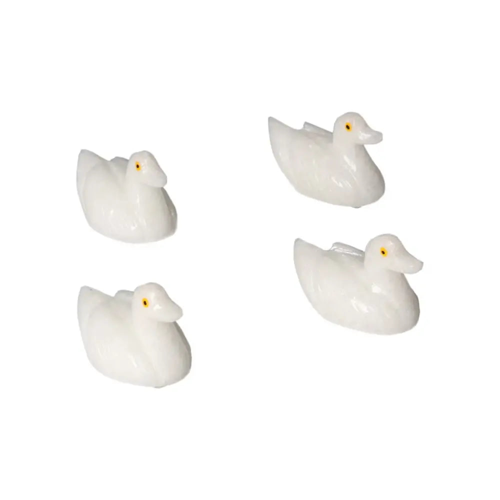 Set of carved dolomite ducks, designed for emotional balance and calming decor.