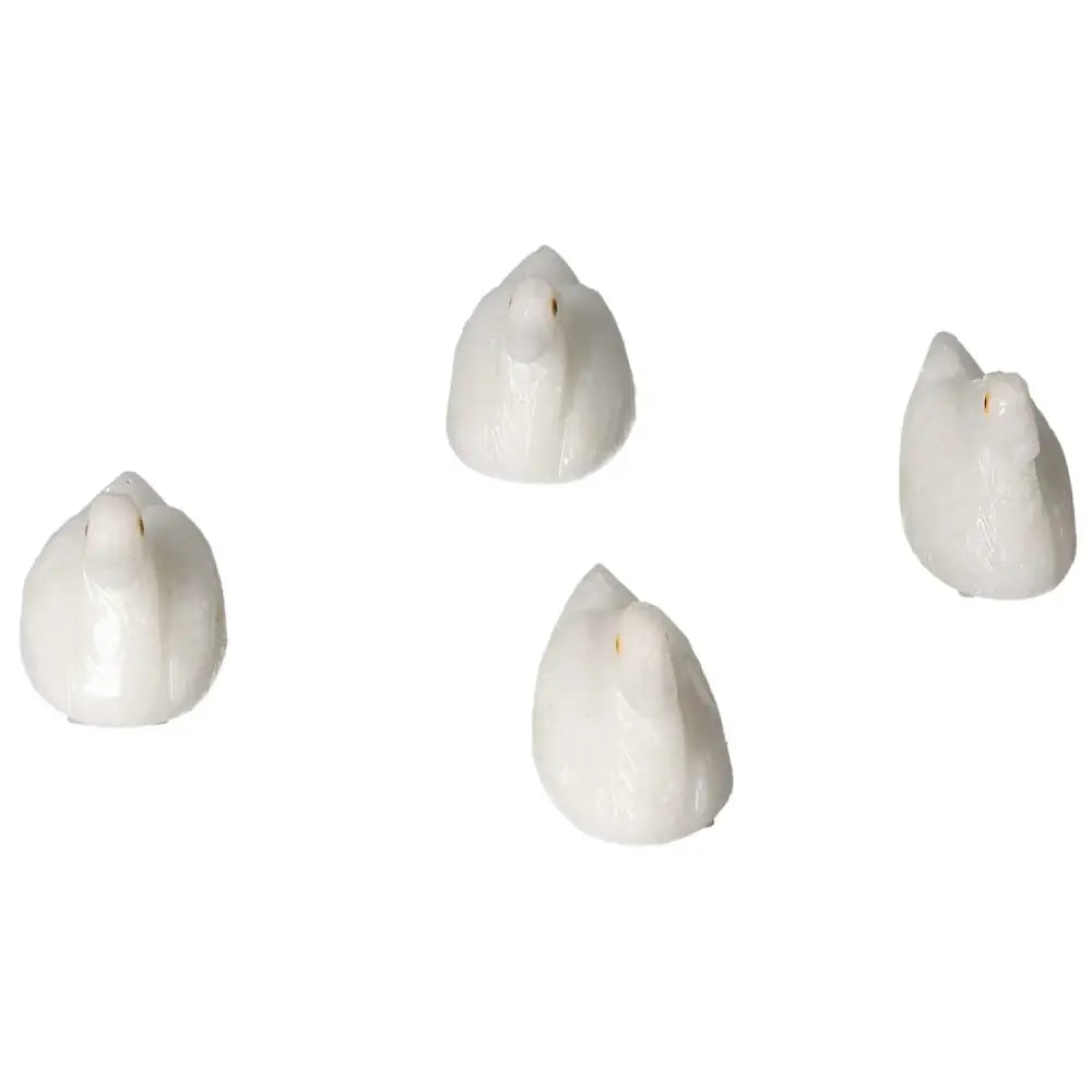 White carved dolomite duck figurines from Sylvia Crystals, designed for emotional balance and grounding.