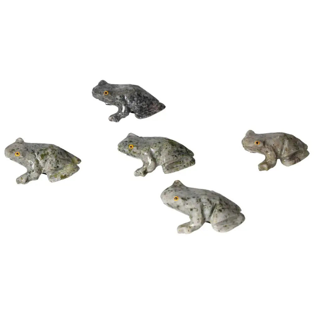 Carved Dolomite Frog sculptures arranged on a white background, showcasing their unique patterns and high-quality craftsmanship.