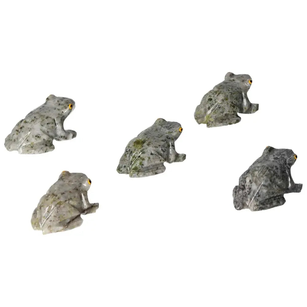 Carved Dolomite Frog sculptures by Sylvia Crystals, showcasing soothing stone qualities for emotional balance and tranquility.