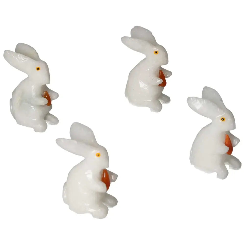 Elegant carved dolomite rabbit sculptures emphasizing luxury and spiritual balance, ideal for home or office decor by Sylvia Crystals.