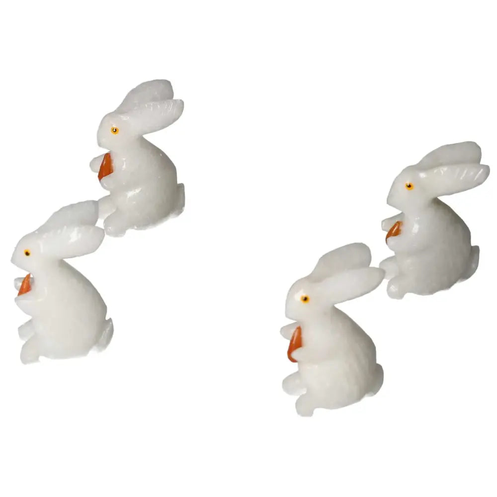 Carved Dolomite Rabbits by Sylvia Crystals, promoting luxury and spiritual balance, ideal for home or office decor.